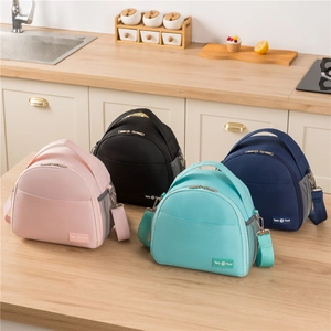 Insulated lunch bags in four colors with adjustable shoulder straps and side mesh pockets
