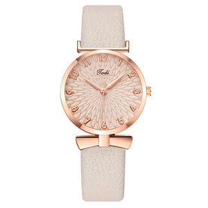 Fashion rose gold women's quartz watch with leather strap and elegant bow detail