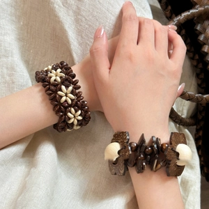 Bohemian coconut shell wood bead stretch bracelet with floral design for women