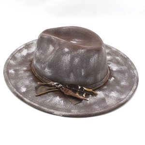 Ethnic style wool felt fedora with distressed finish and feather band detail