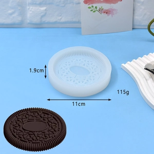 Detail view of round 11cm silicone cookie mold with intricate embossed geometric patterns