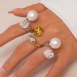 Fashion square crystal and large pearl open rings set for women on pink stone background