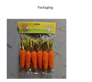 Pack of 6 artificial Easter carrots with orange fuzz texture and green leaves in packaging