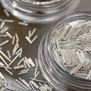 Micro shot of 0.5mm ultra thin silver metal strips for nail art in transparent jar