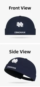 Close-up of white DINGHAN letter embroidery on a navy blue docker hat brim