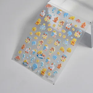 Macro view of 3D embossed nail stickers featuring cartoon sea life and summer patterns