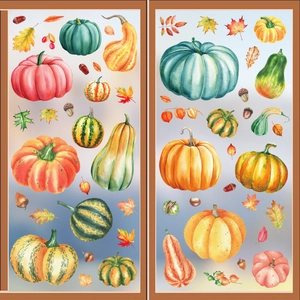 Watercolor fall window clings with pumpkins and autumn leaves on glass window