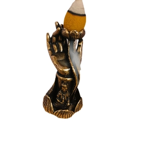 Solid brass backflow incense burner featuring a Buddha hand and lotus flower design