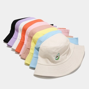 Multiple colors of cotton avocado embroidered bucket hats neatly stacked for outdoor style