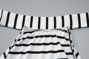 Macro view of black and white striped knit texture and stitching on halter top