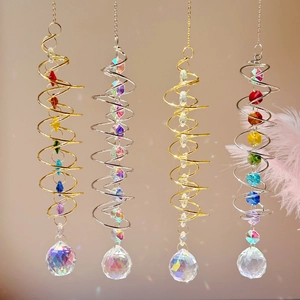 Detail showing four 3D spiral tail wind spinners with colorful crystal balls and prisms