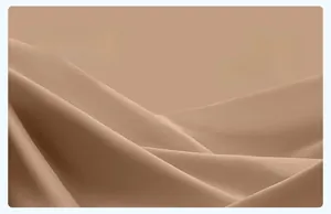 Gros plan du tissu de yoga nude haute élasticité avec texture en maille douce