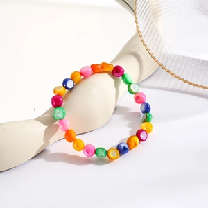 Detail of bohemian stretch bracelet featuring vibrant multi-color natural stone beads