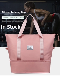 Close-up of pink fitness bag showing the bottom shoe compartment and reinforced handles
