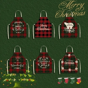 Set of six festive Christmas aprons with red and green plaid patterns and holiday prints