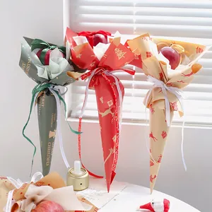 Christmas Kraft paper flower wraps with festive reindeer and tree patterns for holiday gifts