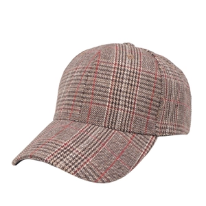 Classic houndstooth baseball cap in vintage brown and red plaid with stiff brim