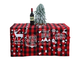 Christmas red black plaid table runner with festive elk and snowflake patterns