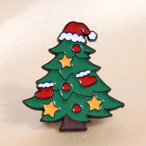 Christmas tree enamel brooch with Santa hat and star on gold satin background