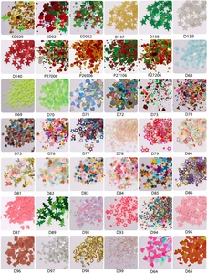 Detailed grid showing Christmas nail art sequins with snowflake and star shapes