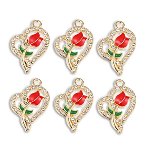 Detailed macro view of heart-shaped red rose alloy charms with sparkling crystal accents