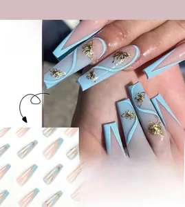 Blue lines and gold butterfly accents on long coffin-shaped press-on nail set