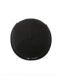 Top view of black Miki hat featuring detailed white embroidery and six-panel stitching