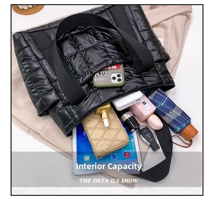 Overhead view showing spacious quilted tote bag capacity with laptop and daily essentials