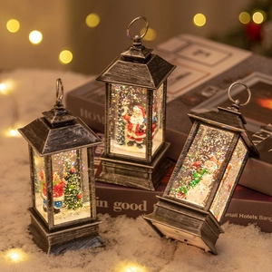 Vintage LED Christmas lantern with Santa and Snowman figures and sparkling water glitter