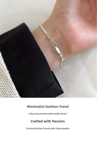 Detail of s925 silver flat snake bone chain bracelet with adjustable spring clasp