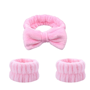 Pink plush microfiber headband with large bow and matching wrist washbands set