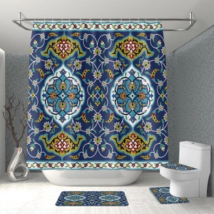 Vibrant blue and yellow shower curtain set with matching bathroom floor mats in modern setting