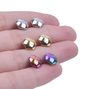 Detail of 304 stainless steel geometric earrings in silver, gold and rainbow finishes