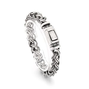 Retro punk twisted rope chain bracelet in antique silver finish for men on stand