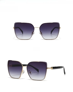 Detail view of gold metal square sunglasses with gray gradient lenses from two angles