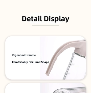 Détail de la poignée ergonomique et de l'échelle de mesure sur la bouteille d'huile en verre