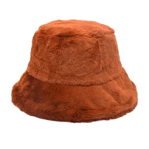 Close-up of fluffy faux mink fur texture on a warm brown winter bucket hat for women