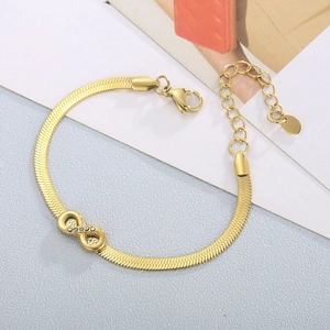 Gold stainless steel infinity symbol snake chain bracelet with sparkling rhinestones