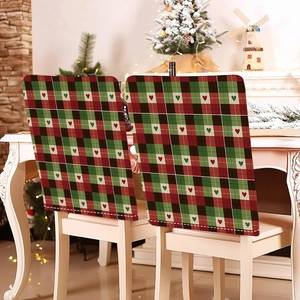 Close-up of Christmas chair covers with red and green plaid patterns and heart motifs