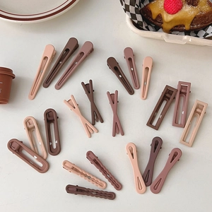 Matte coffee and beige hair clip set including snap clips and duckbill hair pins