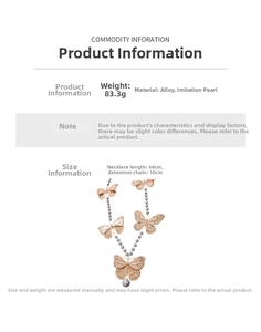 Detailed specs of vintage butterfly necklace with gold alloy and grey pearls