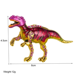 Detail view of enamel dinosaur brooch with rhinestones showing dimensions 4.5cm by 6cm