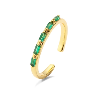 Minimalist gold plated ring with five rectangular green zircons in an open band design