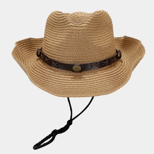 Detailed macro view of woven straw sun hat texture with leather strap and metal buckle