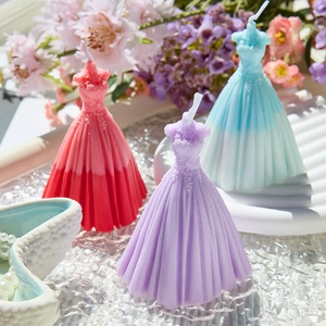 Elegant wedding dress scented candles in red, purple and gradient blue for home decor