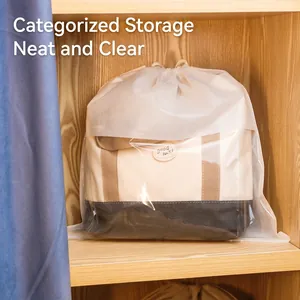 Translucent frosted drawstring bag for dust-proof handbag storage in wooden wardrobe