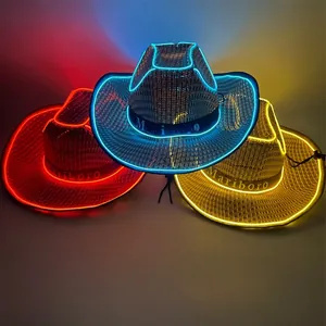 Three glowing LED cowboy hats in red, blue, and yellow glowing in dark party atmosphere