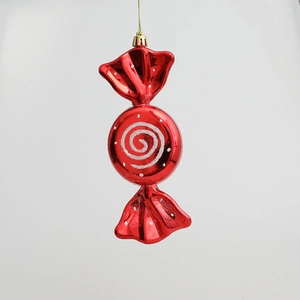 Red Christmas candy ornament with silver glitter swirls and metallic finish