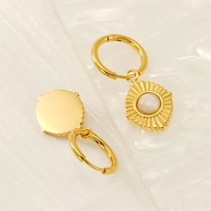 18K gold plated stainless steel hoop earrings with sunburst pendant and white opal stone