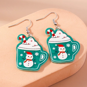 Close-up of green Christmas mug earrings with cute snowman and candy cane details